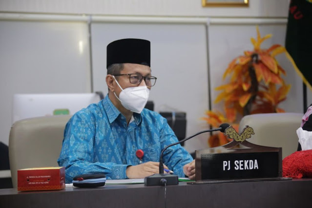 Pj Sekdaprov Riau Hadiri Rakor Tim Pengarah Teknis BRGM secara Virtual