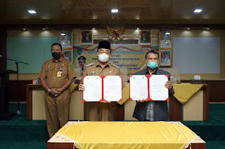 Bupati Inhil HM Wardan Tandatangani MoU Kerja Sama dengan Unisi