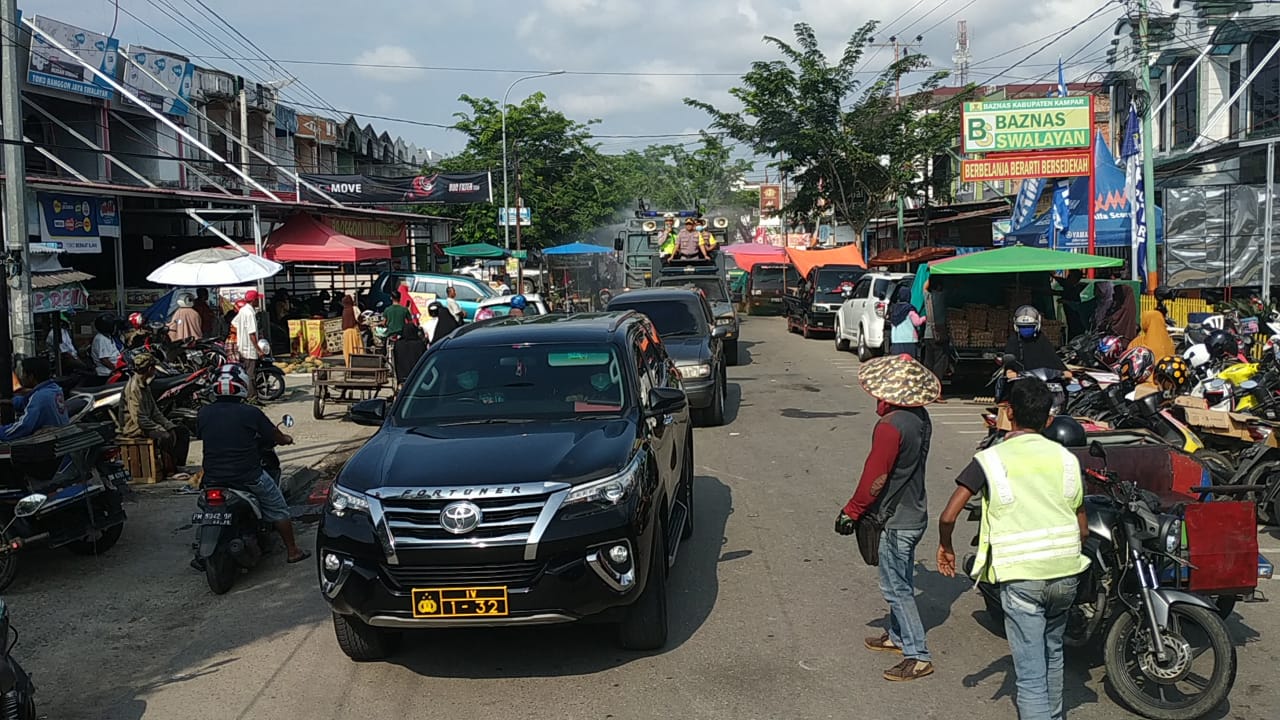 Polres Kampar Lakukan Desinfeksi dengan Mobil AWC dalam Kota Bangkinang