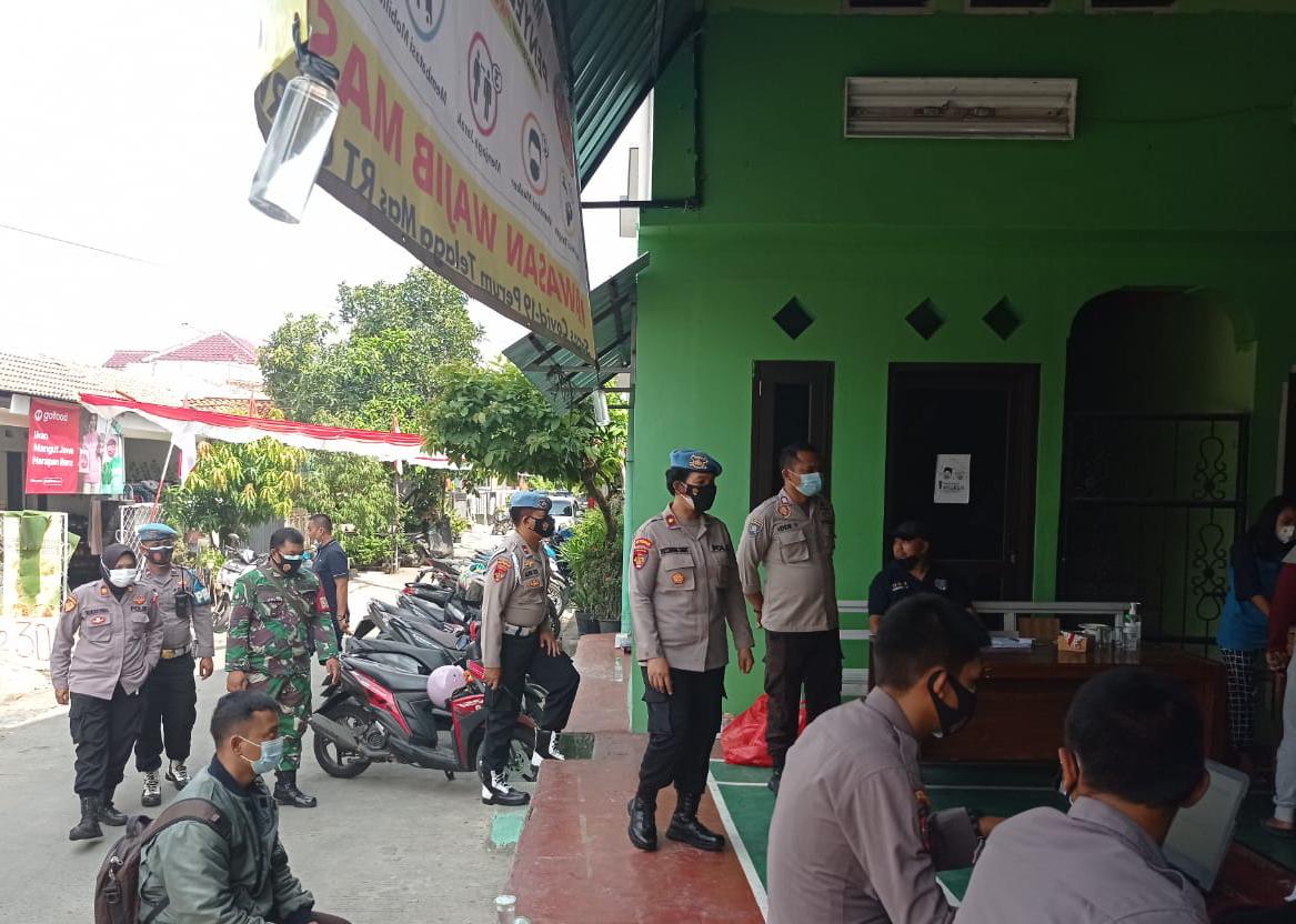 Lakukan Pengecekan Gerai Vaksinasi Merdeka, Propam Polrestro Bekasi Kota: Agar Kegiatan Tertib dan Lancar