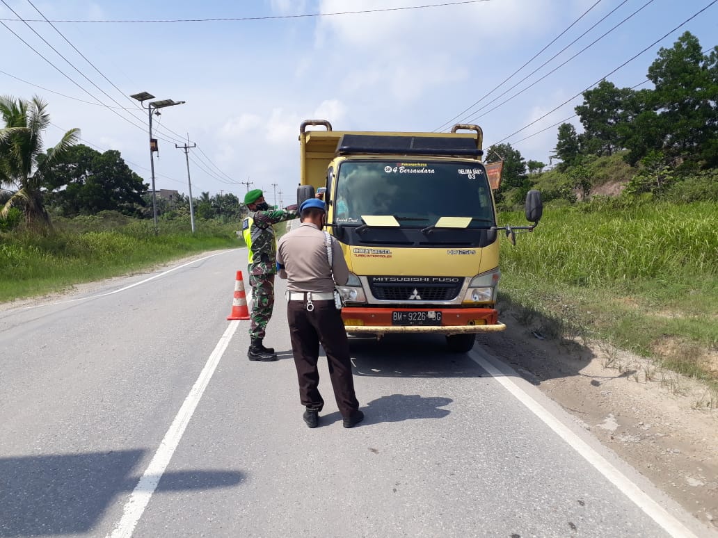 Tim Gabungan Laksanakan Pengamanan Pos Pantau Kerinci Kanan guna memutuskan mata rantau Penyebaran Covid-19
