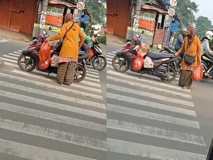 Aksi Emak-emak Ini Parkirkan Sepeda Motornya di Tengah Jalan, Netizen: The Power of Emak-emak