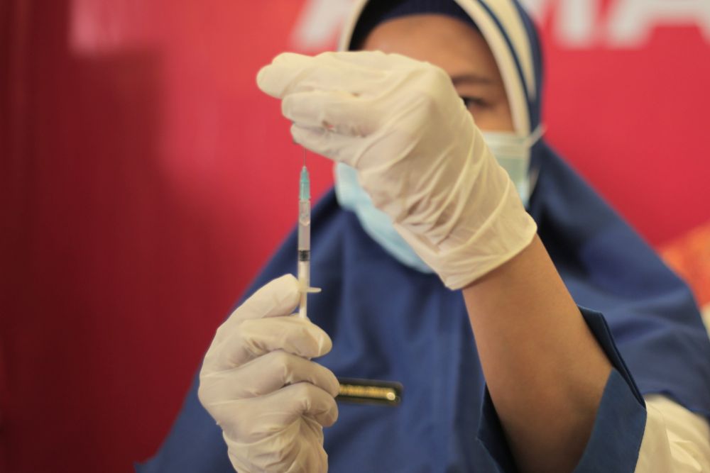 Vaksinasi Covid-19 Dosis I di Riau Capai 99,82 Persen