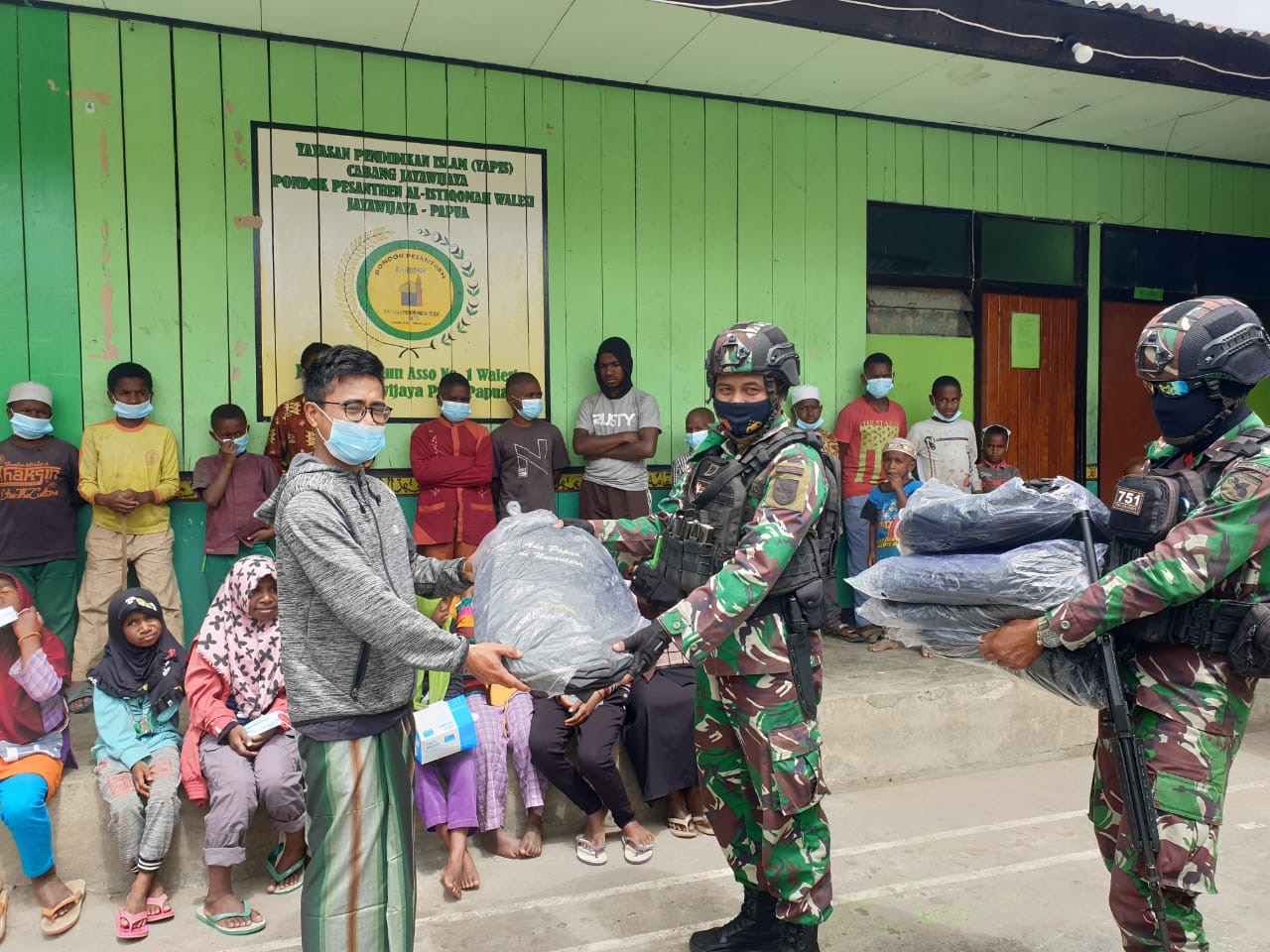 Menyambut HUT Batalyon ke-57, Satgas Yonif RK 751/VJS Menebar Senyum di Pegunungan Tengah Papua